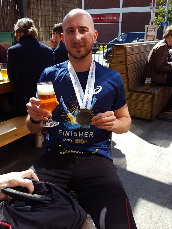 Adam after finishing the Manchester Marathon